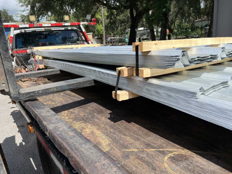 Photo of Corrugated Metal on Bed of Towing Truck